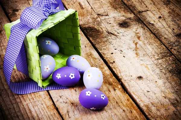 Easter eggs painted on the wooden background. — Stock Photo, Image