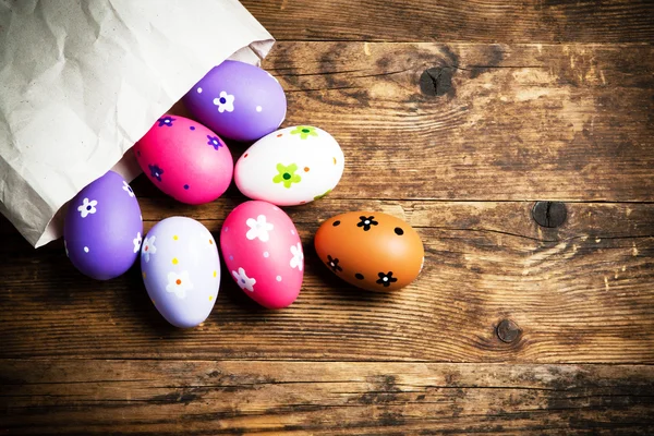 Easter eggs painted on the wooden background. — Stock Photo, Image