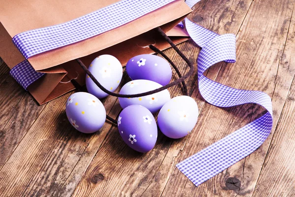 Easter eggs painted on the wooden background. — Stock Photo, Image