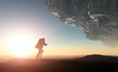 astronot güneş ışığında silüeti.