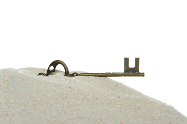 Key on sand — Stock Photo, Image