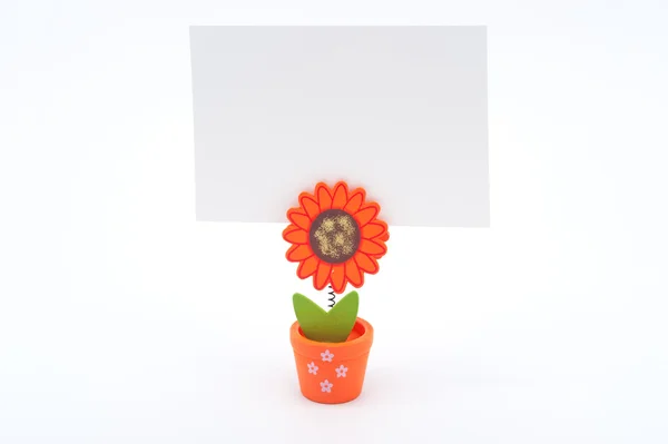 Livro branco sobre vaso de flores — Fotografia de Stock