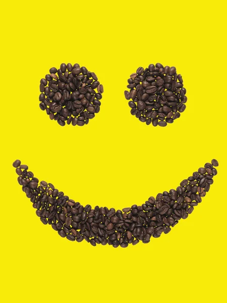Smil lavet af kaffebønner - Stock-foto