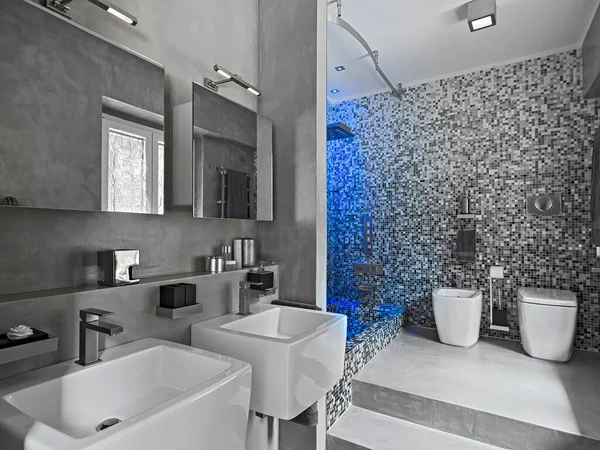 现代浴室的内部图片说明在前面两堵墙的后面是安装好的洗脸盆 浴盆和马桶 底部的墙上覆盖着马赛克瓷砖 — 图库照片