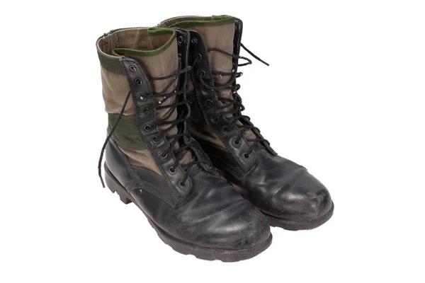 Vecchi stivali da giungla usati periodo di guerra Vietnam isolato — Foto Stock