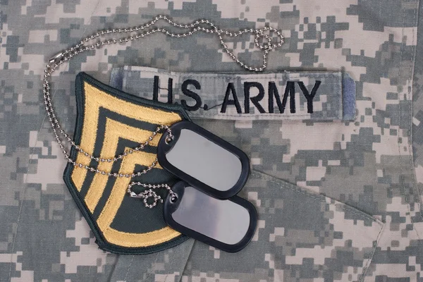 Us army uniform period with blank dog tags and sergeant rank patch — Stock Photo, Image