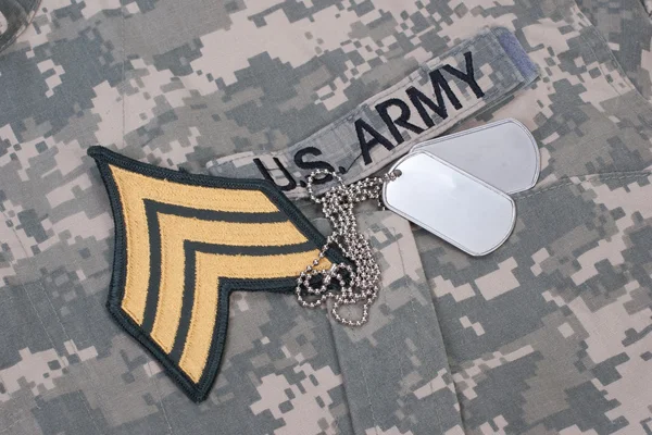 Us army uniform period with blank dog tags and sergeant rank patch — Stock Photo, Image