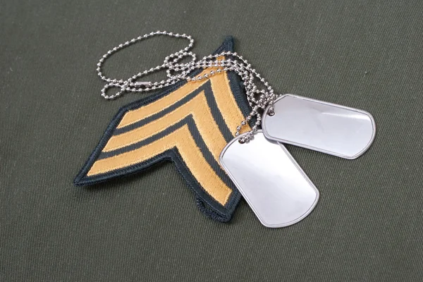 Us army uniform period with blank dog tags and sergeant rank patch — Stock Photo, Image