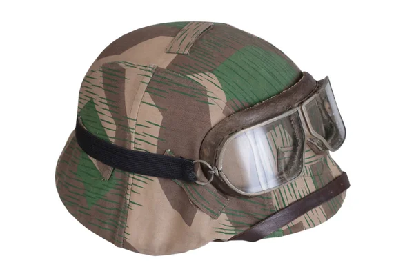 Camouflaged nazi german helmet with protective goggles — Stock Photo, Image