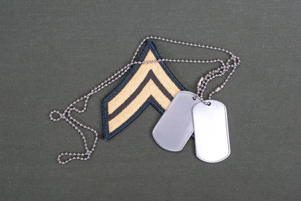 Us army uniform with blank dog tags and sergeant rank patch — Stock Photo, Image