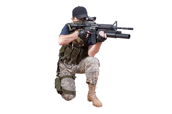 Shooting mercenary isolated — Stock Photo, Image