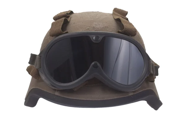 Kevlar helmet with camouflage cover and protective goggles — Stock Photo, Image