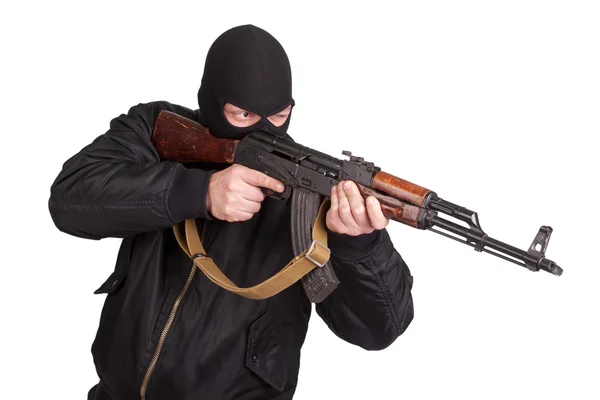 Terrorist met kalashnikov — Stockfoto