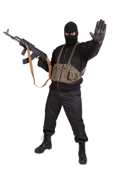 Terrorist met kalashnikov — Stockfoto