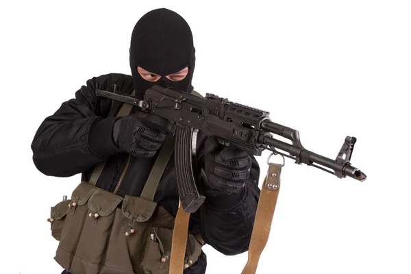 Terrorist met kalashnikov — Stockfoto