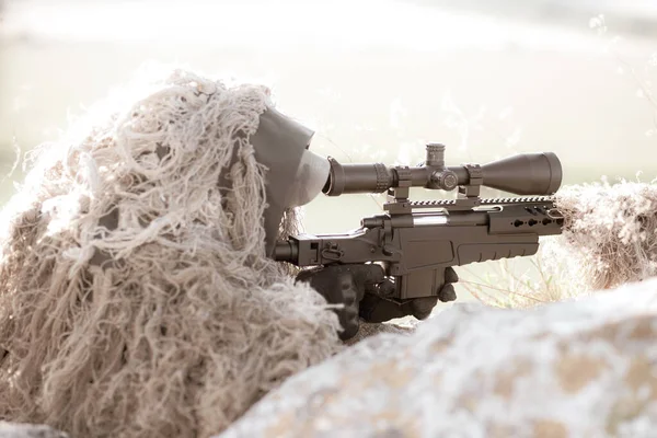 camouflaged sniper rifle with optic sight Stock Photo - Alamy