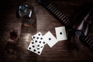 Old west poker. Dead man's hand. Two-pair poker hand consisting of the black aces and black eights, held by Old West gunfighter Wild Bill Hickok when he was murdered while playing a poker game. clipart