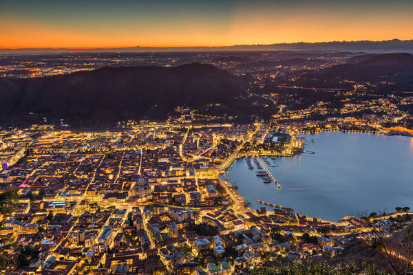 Como, Italy Cityscape from above at dusk.
