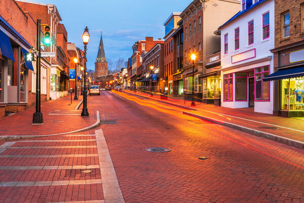 Annapolis, Maryland, USA downtown on Main Street towards St. Anne's Parish at dawn.
