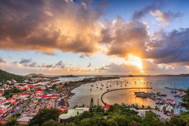 Marigot, St. Martin town skyline in the Caribbean at dusk. clipart