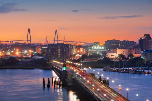 Charleston, South Carolina, USA skyline over the Ashley River at twilight.