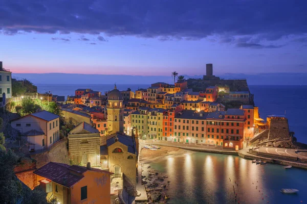 Vernazza, La Spezia, Liguria, Italy in the Cinque Terre region at twilight.