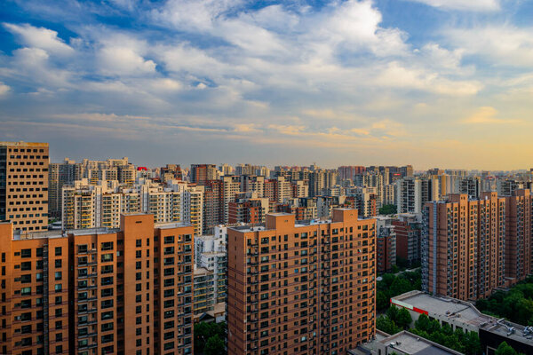 Beijing, China apartment block skyline at dusk.