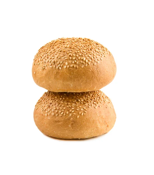 Two round rolls with sesame lie on each other — Stock Photo, Image