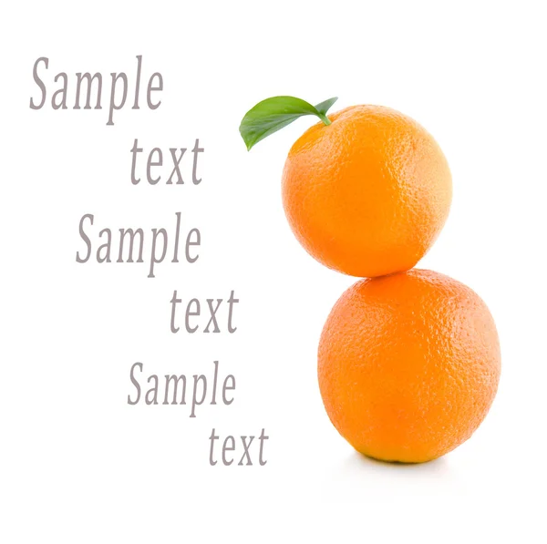 Two oranges stand on each other on a white background — Stock Photo, Image