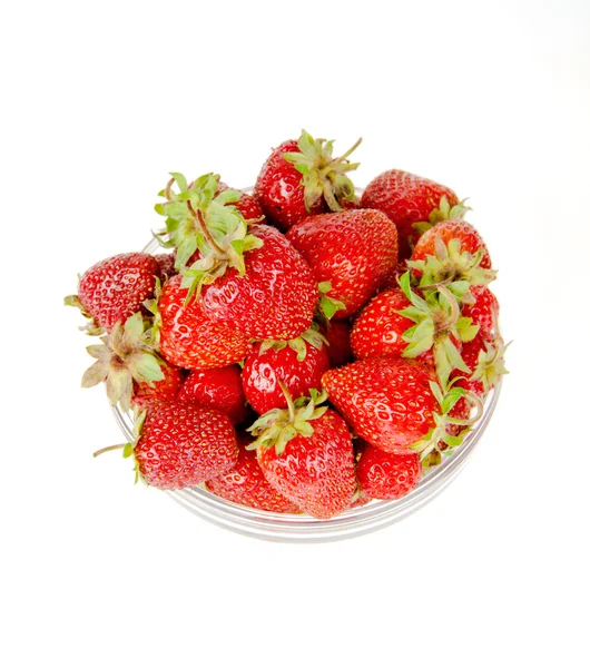 Plate with strawberries view from the top on a white background — Stock Photo, Image