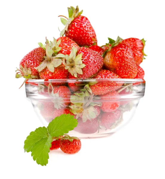 Berry of strawberry with a sheet on a background a dish with a s — Stock Photo, Image