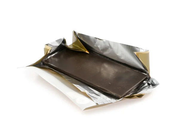 Black chocolate is in the exposed packing — Stock Photo, Image