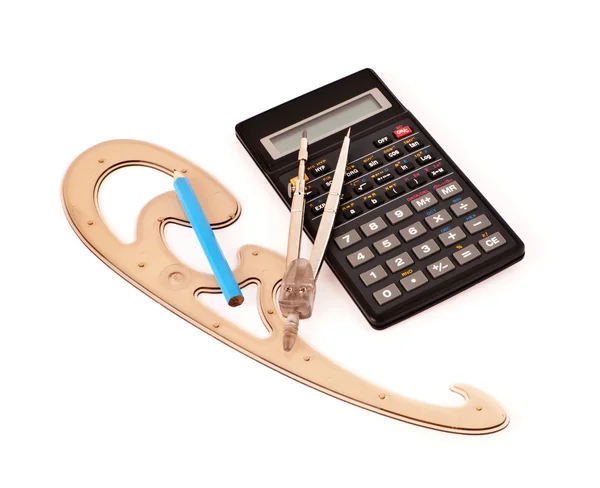 Potlood op een rekenmachine, kompassen en Frans curve op wit — Stockfoto