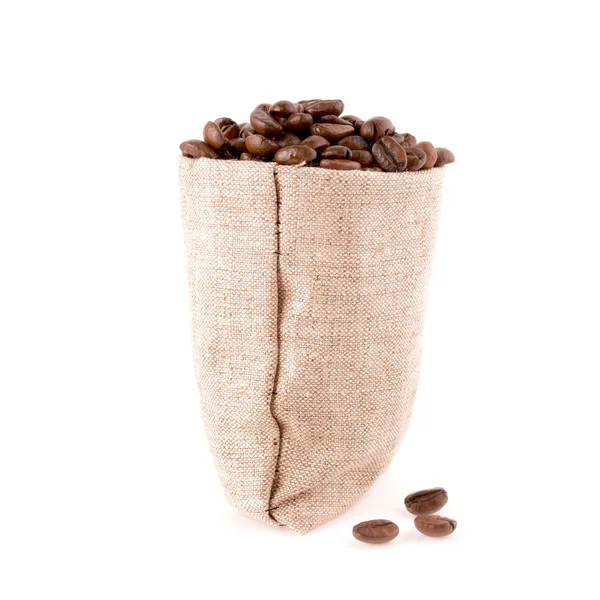 Coffee bean bag and three grain lie side by side on a white back — Stock Photo, Image
