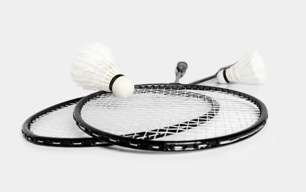 Raquetas para bádminton y Shuttlecock dos monocromas —  Fotos de Stock