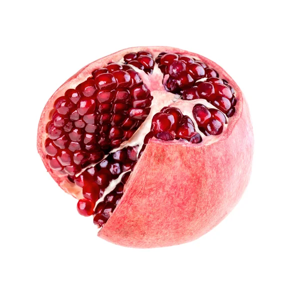 Pomegranate fruit is cut with grains on a white background — Stock Photo, Image