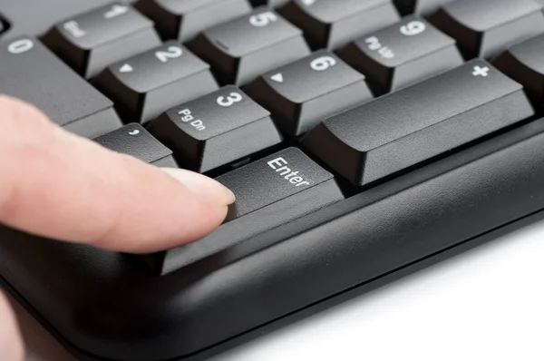 Finger women presses a key on the keyboard macro — Stock Photo, Image