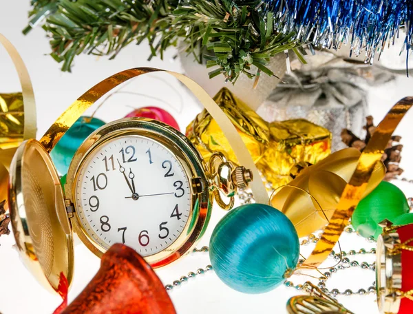 Clock,Christmas decorations on the background of a Christmas tree — Stock Photo, Image