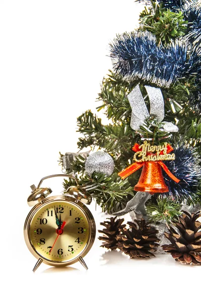 Clock, bumps on the background of a decorated Christmas tree in the white — Stock Photo, Image