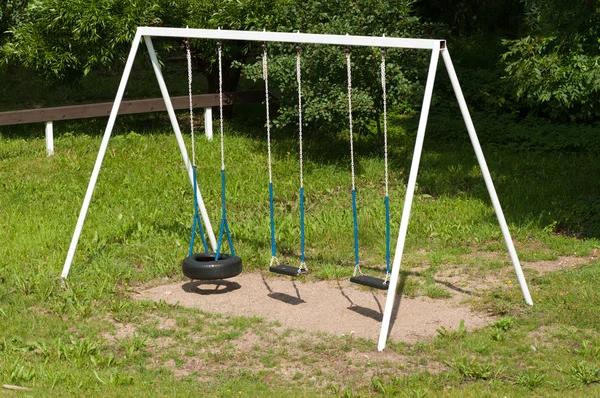 Old empty swing — Stock Photo, Image