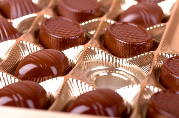 Empty cells in a box of chocolates — Stock Photo, Image