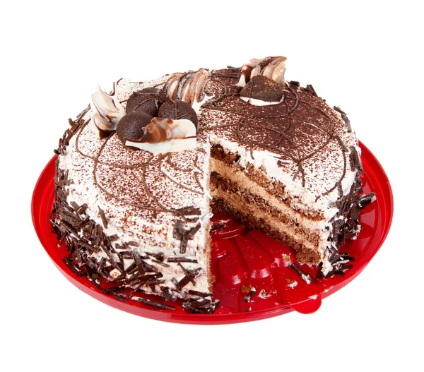 Chocolate cake on red plate — Stock Photo, Image