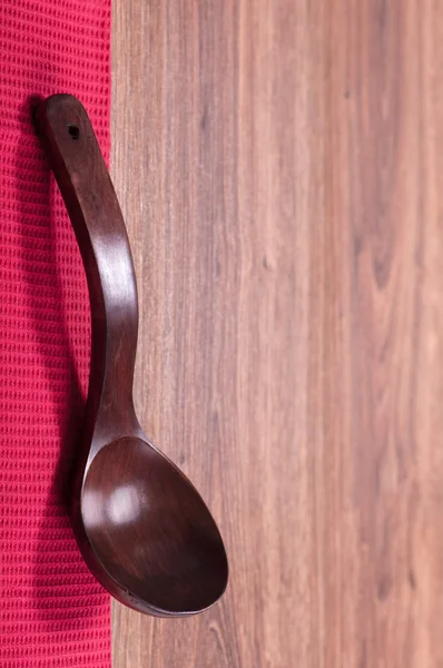 Red wooden spoon — Stock Photo, Image