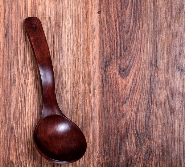 Red wooden spoon — Stock Photo, Image