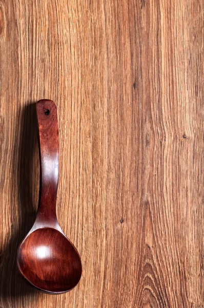 Red wooden spoon — Stock Photo, Image