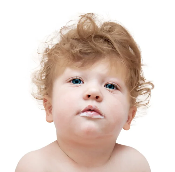 Young child with stained lips in a mess — Stock Photo, Image