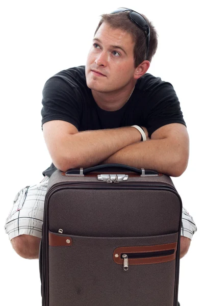 Muž mladý cestující se zavazadly — Stock fotografie
