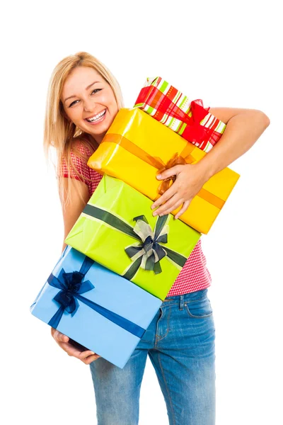 Young attractive laughing woman with gifts — Stock Photo, Image