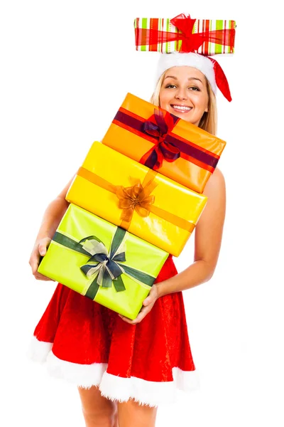 Happy woman in Santa costume with Christmas gifts — Stock Photo, Image