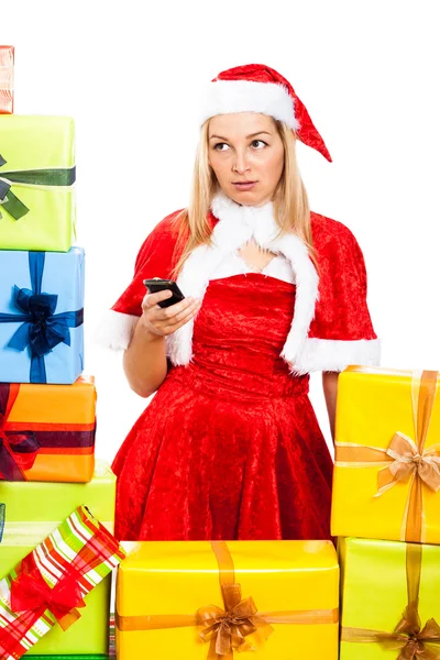 Worried female Christmas Santa with mobile phone — Stock Photo, Image